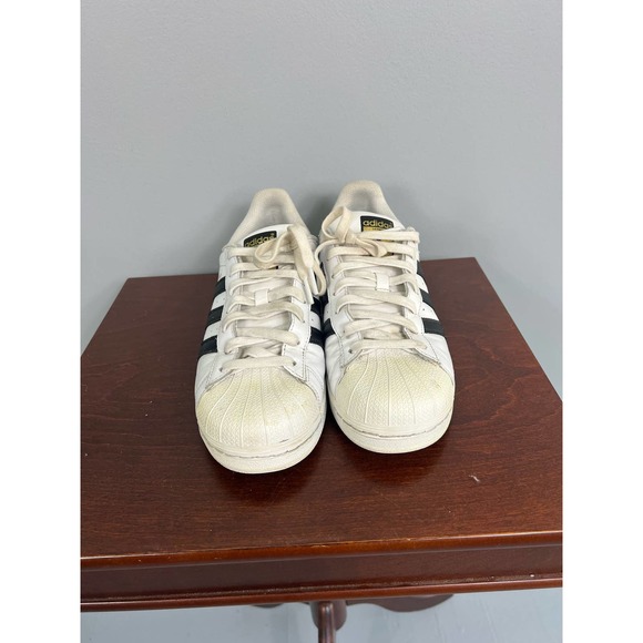 adidas Shoes - Adidas white and black striped sneakers